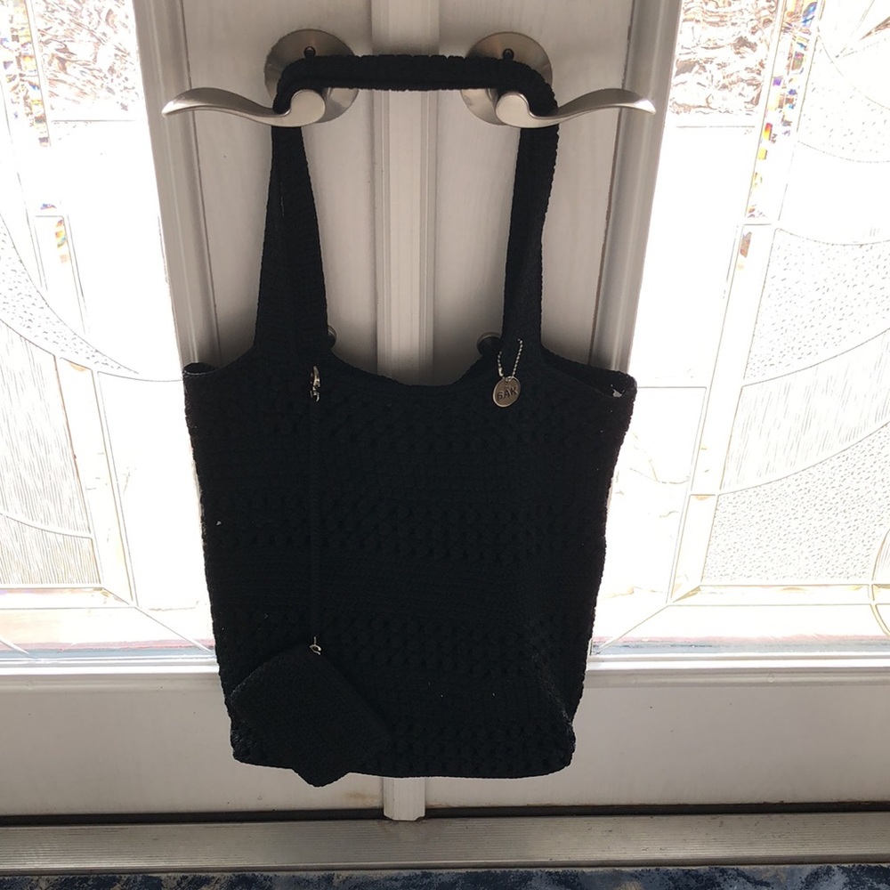 The sak market bag/Tote. Has additional little pouch that can be connected.